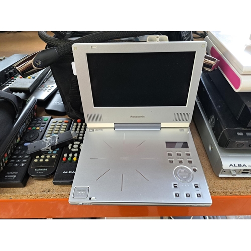 717 - A collection of AV items to include Panasonic DVD-LV75 portable DVD player, Sony DVP-SR750H DVD play... 