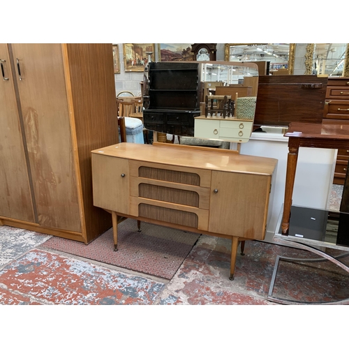 105 - A 1960s C.W.S. Ltd. walnut and teak effect dressing table