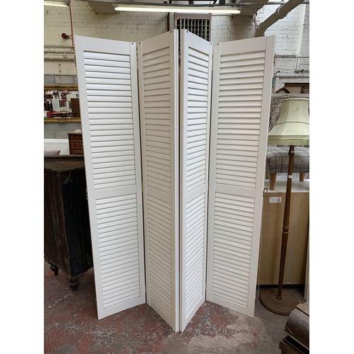 108 - A white laminate four section folding dressing screen - approx. 207cm high x 160cm wide