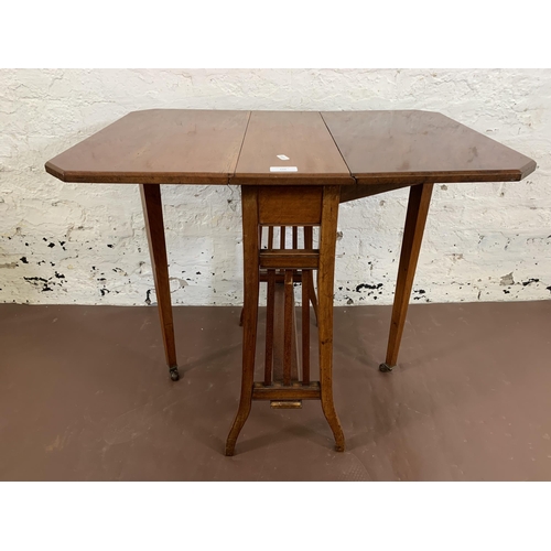 109 - An Edwardian mahogany drop leaf Sutherland table - approx. 62cm high x 50cm wide x 71cm long