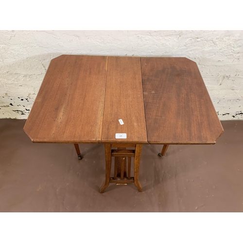 109 - An Edwardian mahogany drop leaf Sutherland table - approx. 62cm high x 50cm wide x 71cm long