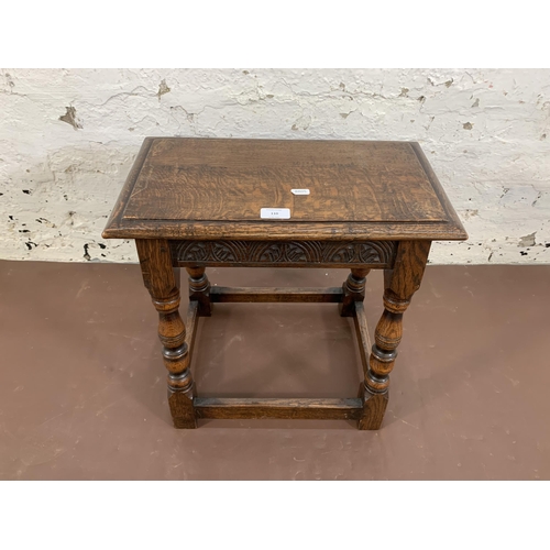 110 - A 17th century style carved oak joint side table - approx. 47cm high x 46cm wide x 25cm deep