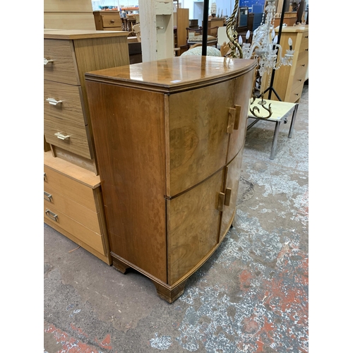 114 - An Art Deco style walnut four door cocktail cabinet - approx. 103cm high x 75cm wide x 44cm deep