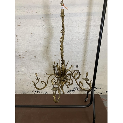 115 - A Rococo style gilt metal five branch chandelier - approx. 120cm drop