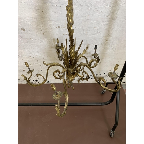 115 - A Rococo style gilt metal five branch chandelier - approx. 120cm drop