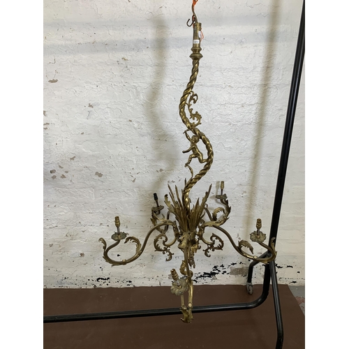 115 - A Rococo style gilt metal five branch chandelier - approx. 120cm drop