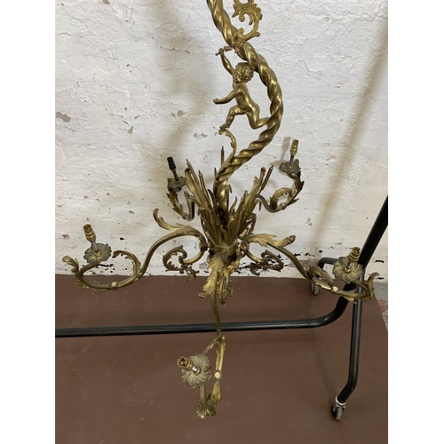 115 - A Rococo style gilt metal five branch chandelier - approx. 120cm drop