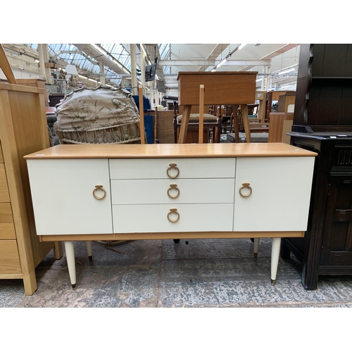 119 - A mid 20th century Schreiber oak and white laminate dressing table