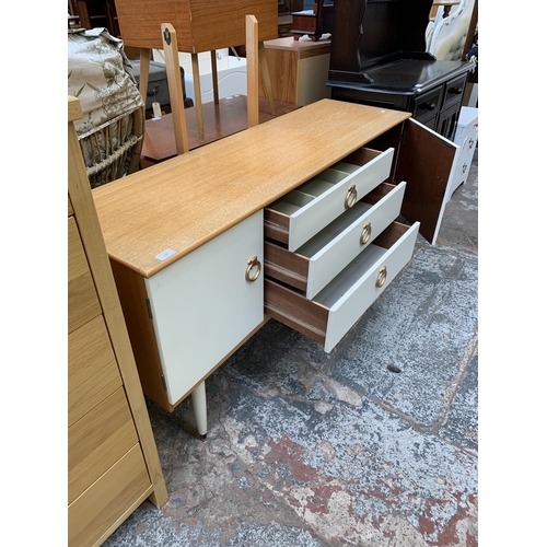 119 - A mid 20th century Schreiber oak and white laminate dressing table