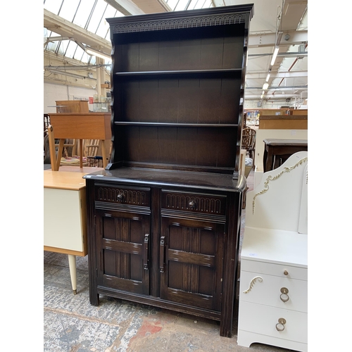 120 - A carved oak dresser - approx. 172cm high x 90cm wide x 42cm deep