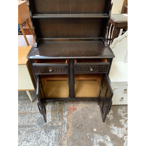 120 - A carved oak dresser - approx. 172cm high x 90cm wide x 42cm deep