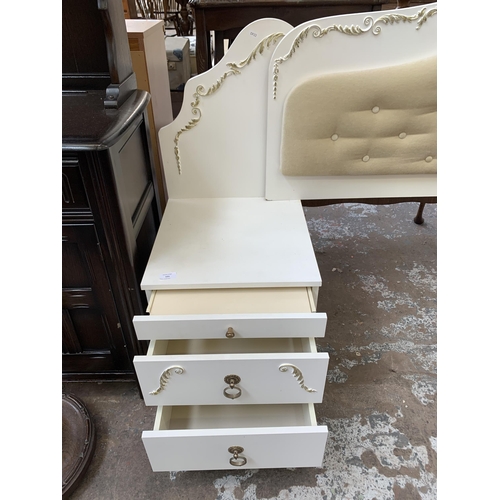 121 - A French style white painted and gilded bedstead - approx. 120cm high x 229cm wide