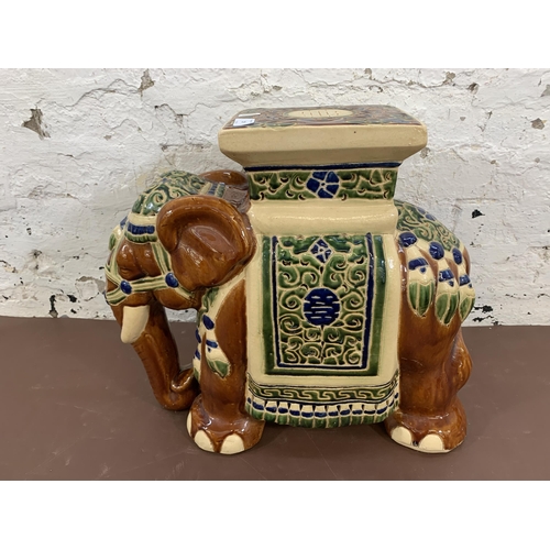 129 - A ceramic elephant plant stand - approx. 44cm high x 20cm wide x 60cm long