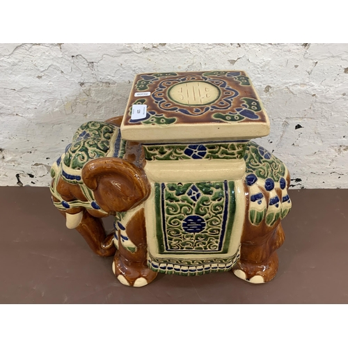 129 - A ceramic elephant plant stand - approx. 44cm high x 20cm wide x 60cm long