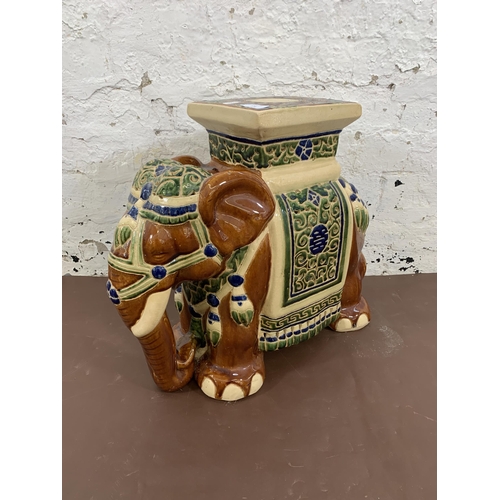 129 - A ceramic elephant plant stand - approx. 44cm high x 20cm wide x 60cm long