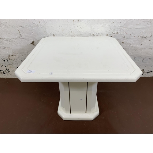 130 - A mid 20th century white painted fibreglass octagonal side table