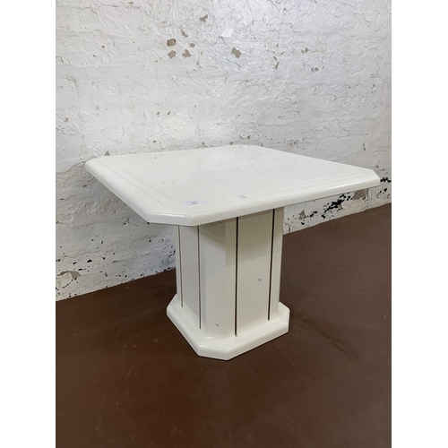 130 - A mid 20th century white painted fibreglass octagonal side table