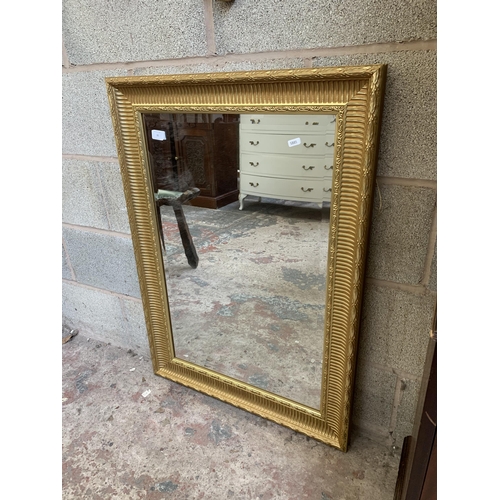 15 - A 19th century style gilt framed bevelled edge wall mirror - approx. 91cm high x 65cm wide