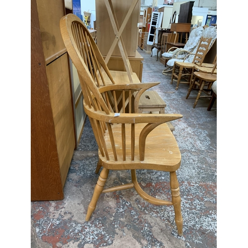 151 - A 19th century style beech Windsor chair