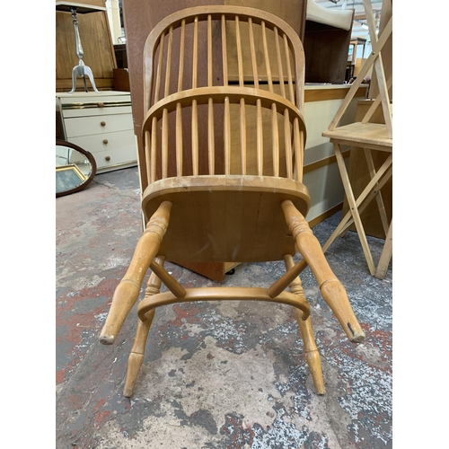 151 - A 19th century style beech Windsor chair