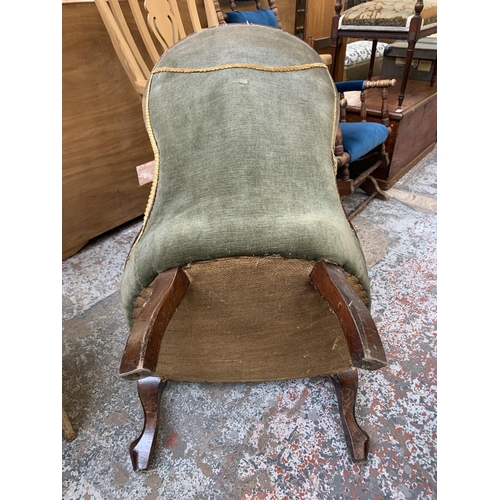 158 - A Victorian mahogany and fabric upholstered spoon back nursing chair