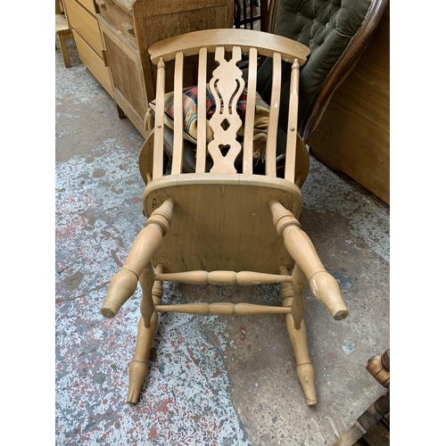 159 - A Victorian style beech farmhouse armchair