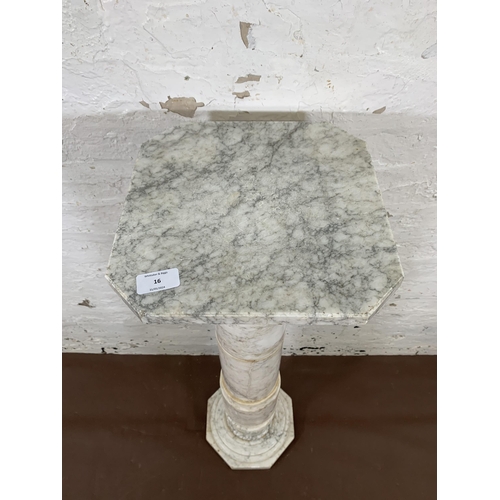 16 - A 19th century style marble column jardinière stand with octagonal top and base - approx. 100cm high... 