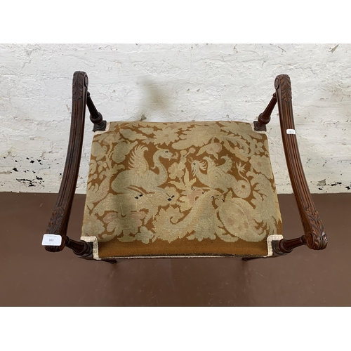 161 - A Victorian rosewood and tapestry upholstered twin handled stool - approx. 62cm high x 58cm wide x 4... 