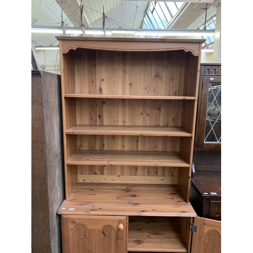 177 - A modern pine bookcase - approx. 190cm high x 95cm wide x 45cm deep