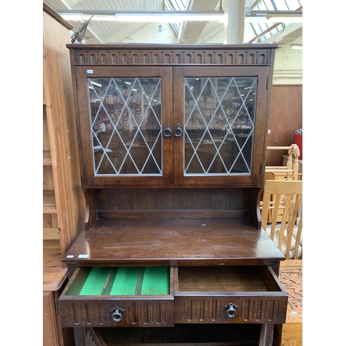 178 - A carved oak linenfold dresser - approx. 179cm high x 95cm wide x 44cm deep