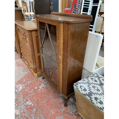 185 - A mid 20th century oak display cabinet on cabriole supports - approx. 118cm high x 73cm wide x 32cm ... 