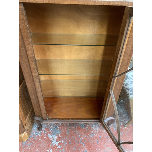 185 - A mid 20th century oak display cabinet on cabriole supports - approx. 118cm high x 73cm wide x 32cm ... 