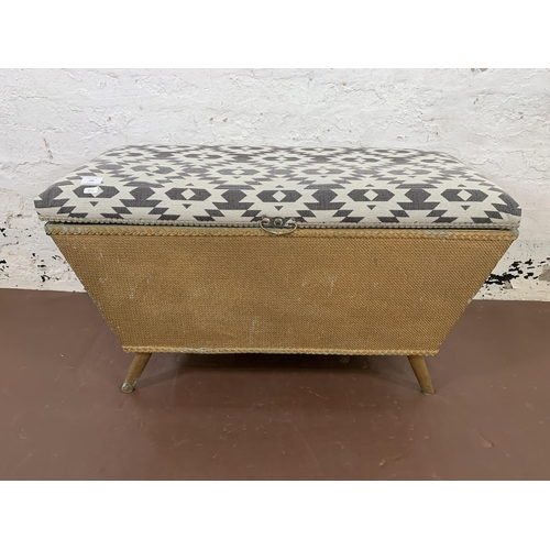 186 - An early/mid 20th century Lloyd Loom ottoman with fabric upholstered top - approx. 55cm high x 93cm ... 