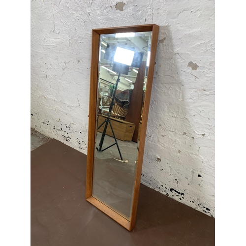 187 - A mid 20th century teak framed wall mirror - approx. 95cm x 34cm