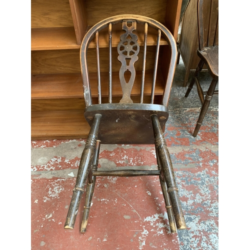 190 - Four elm and beech wheelback dining chairs