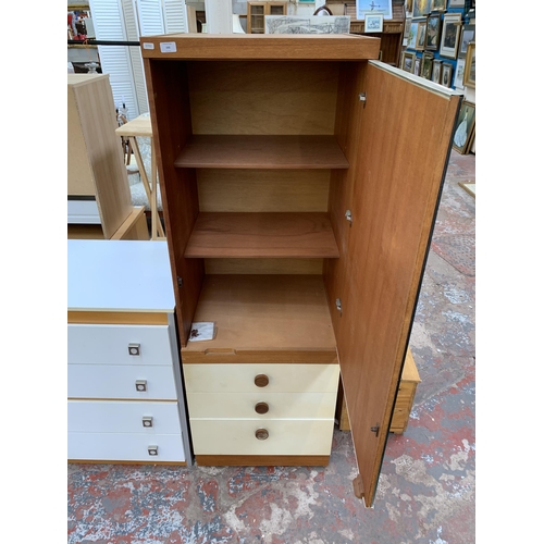 193 - A mid 20th century teak and white laminate mirror door wardrobe