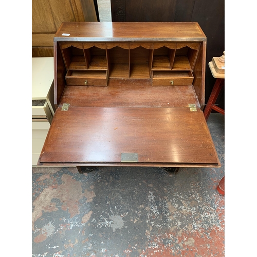 198 - An Edwardian inlaid mahogany bureau