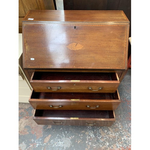 198 - An Edwardian inlaid mahogany bureau