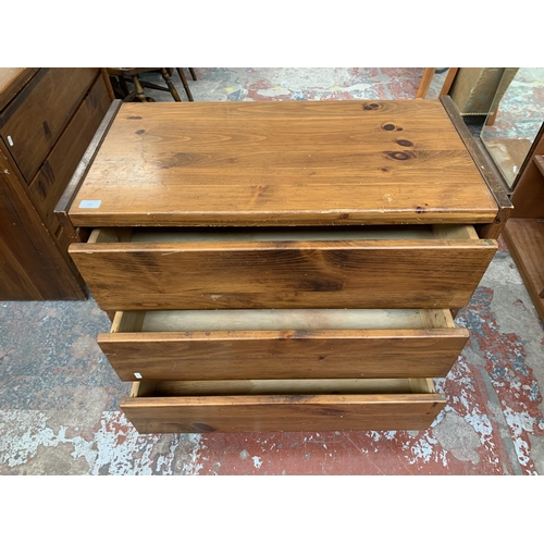 203 - A pine chest of drawers - approx. 78cm high x 86cm wide x 45cm deep