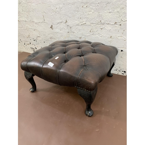 21 - A brown leather Chesterfield footstool on cabriole supports - approx. 30cm high x 60cm wide x 60cm d... 