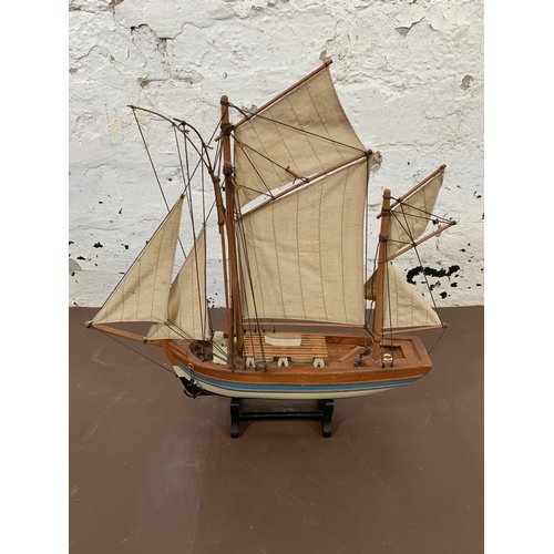 214A - Three handmade wooden model ships largest approx. 55cm high x 72cm long