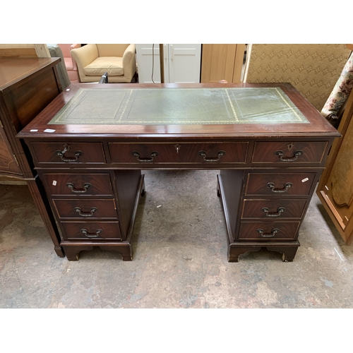 22 - A 19th century style mahogany pedestal writing desk with green leather insert - approx. 77cm high x ... 