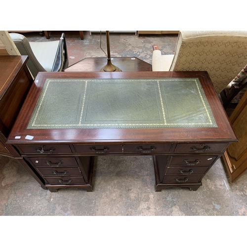 22 - A 19th century style mahogany pedestal writing desk with green leather insert - approx. 77cm high x ... 