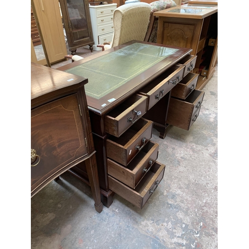 22 - A 19th century style mahogany pedestal writing desk with green leather insert - approx. 77cm high x ... 