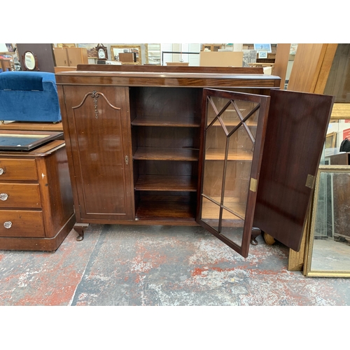 224 - An early 20th century Harrops of Manchester mahogany display cabinet - approx. 127cm high x 137cm wi... 