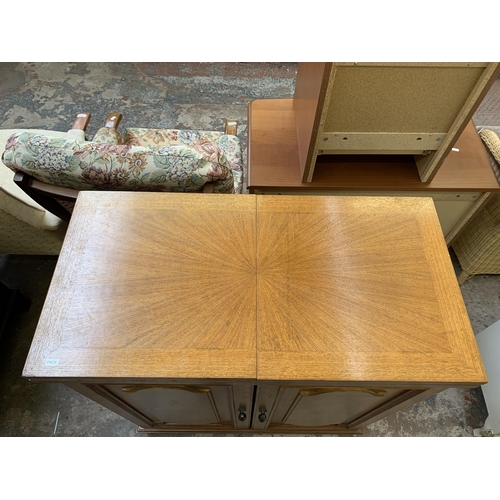 23 - A mid 20th century teak and burr walnut effect metamorphic cocktail cabinet/bar with marble inlay - ... 