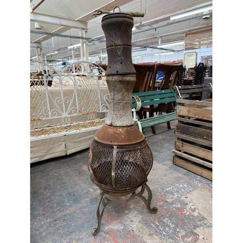 232 - A cast metal garden chimenea - approx. 88cm high