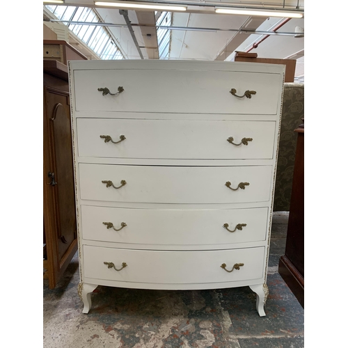 24 - A French Louis XV style white painted and gilded chest of drawers - approx. 99cm high x 75cm wide x ... 