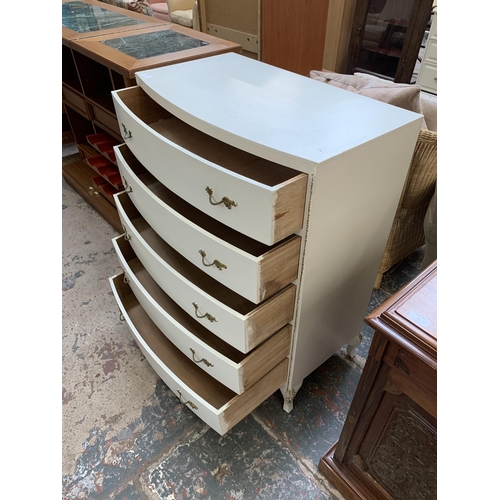 24 - A French Louis XV style white painted and gilded chest of drawers - approx. 99cm high x 75cm wide x ... 