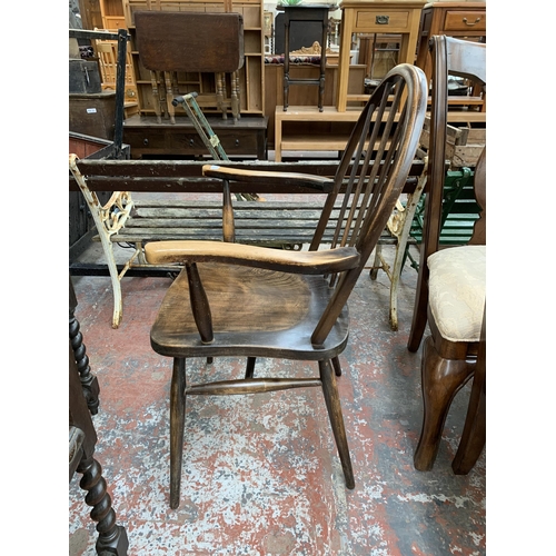 241 - A mid 20th century Ercol Windsor elm and beech armchair